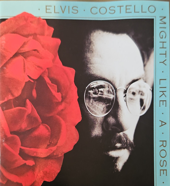 Elvis Costello — Mighty Like A Rose album cover